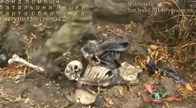 Ополченцы нашли скелеты убитого ребенка и матери: Видео с захоронения